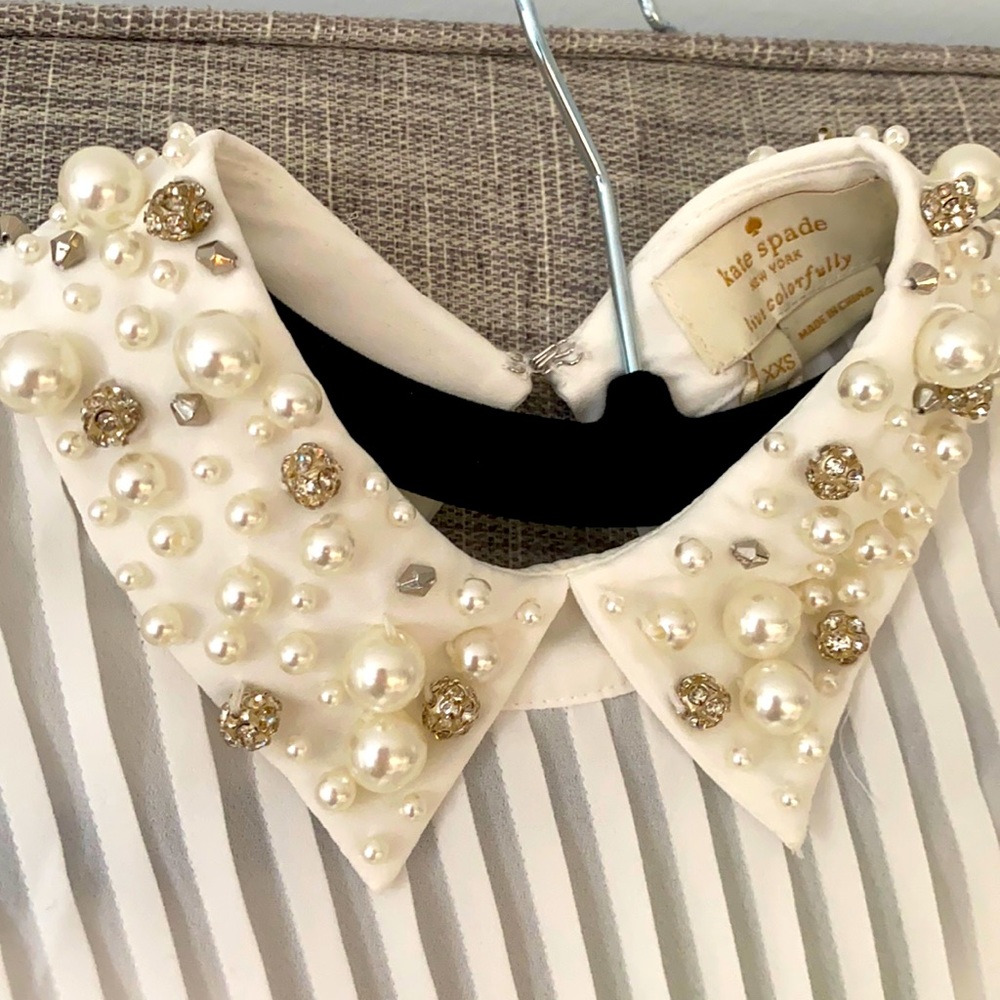 Classic chic white top with jewelry